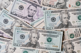 A Photo of Dollar Bills